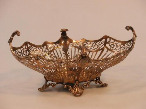 An Edwardian silver gilt basket by George Jackson and David Fullerton