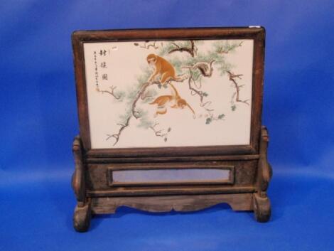 Chinese plaque hand painted in frame and on a stand