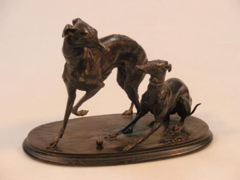 After Pierre Jules Mene. A Bronze Animalier Group of two greyhounds with a ball