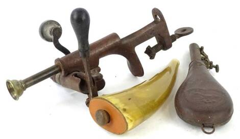 A gun cartridge loading device, with clamp, etc., a leather and copper shot flask, moulded with a dog, a horn flask. (3)