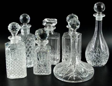 Various cut glass decanters and other decanters and stoppers, to include a ship's decanter, some square section examples, etc.