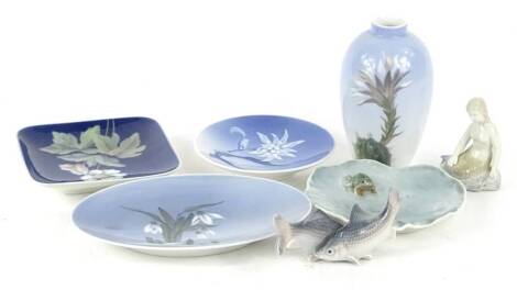 A collection of Royal Copenhagen porcelain, to include a mermaid figure, fish group, oval dish, vase and a frog and lily pad dish.