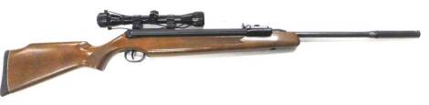 A Diana 55/22 calibre air rifle, with sight and silencer.