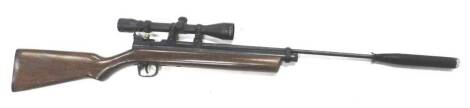 A 2260 air rifle, with Simmons sight and a silencer, 117cm L.