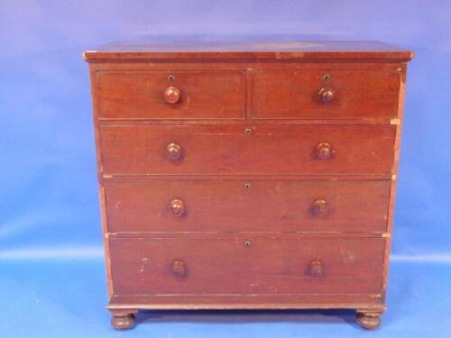 A Victorian mahogany chest of two short and three long graduated drawers