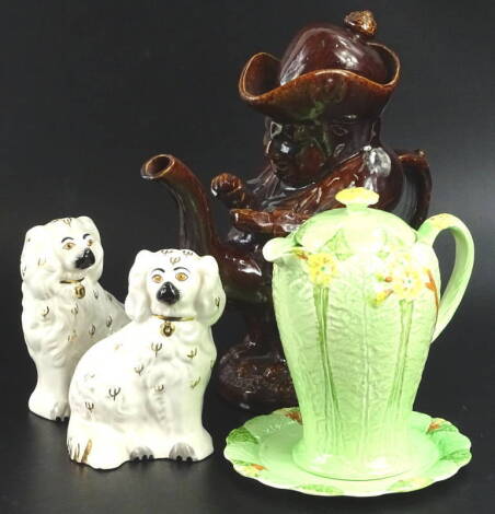 A 19thC Staffordshire treacle glazed Toby shaped teapot, with lid, pair of Beswick Staffordshire type Spaniels and a Royal Minton coffee pot cover and stand.