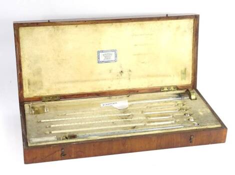 A set of five Mercury thermometers, and a test tube with weighted brass base, stamped R Griffin and Co of Glasgow in original mahogany fitted box stating importers of chemical apparatus.