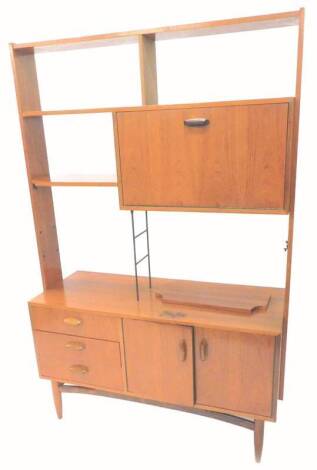 A retro style G-plan teak display unit, with a four front cupboard, the base with three drawers and two doors, on turned tapering legs, (AF), 125cm W.