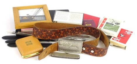Various items of Ruston Bucyrus souvenirs, memorabilia etc., to include pen knives, a VHS video, Caterpillar belt buckle etc.