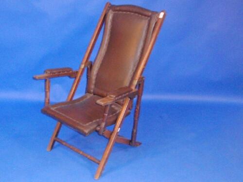 A teak folding schooner chair