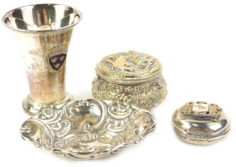 A collection of small silver plated items etc., to include a sovereign case applied with the crest of the City of Liverpool, a small beaker, circular box and cover and a bon bon dish. (4)