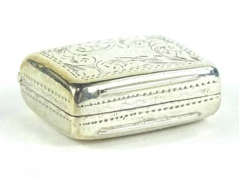 A Victorian silver vinaigrette, the hinged lid engraved with scrolls etc., the silver gilt interior with a pierced hinged grill, Birmingham assay by Edward Smith, 2cm W.