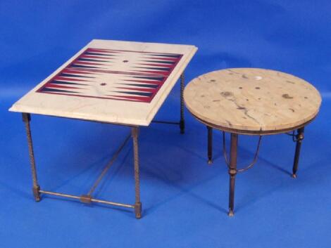 A backgammon coffee table and another coffee table inlaid with watch parts