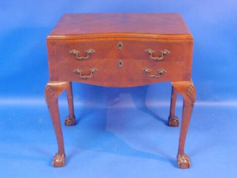 A walnut serpentine cutlery chest on cabriole legs