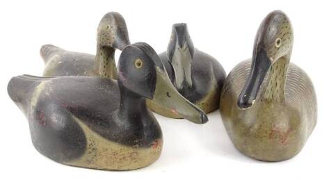 Four similar carved wooden decoy style ducks, various breeds, 27cm L.