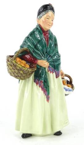 A Royal Doulton porcelain figurine, The Orange Lady, HN1953, 21cm H.