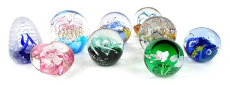 A collection of Caithness and other glass paperweights, various models, sizes etc.