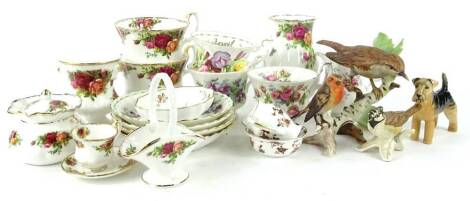 A collection of ceramics, to include Royal Albert Old Country Roses, Beswick Terrier, Goebel birds etc.