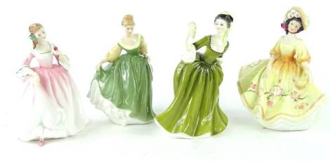 Four Royal Doulton porcelain figurines, Tender Moment, Simone, Sunday Best and Fair Lady.