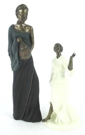 A Minton porcelain and bronze figure of a Grecian dancer, and a limited edition bronzed resin composition figure of a Masai warrior number 2626 of 5000.