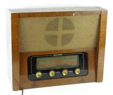 An Ambassador valve radio, in a walnut case, 53cm W.