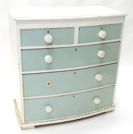 A Victorian painted pine bowfront chest of drawers, the top with a moulded edge above two short and three long drawers, with turn wood handles on block feet, 92cm W.