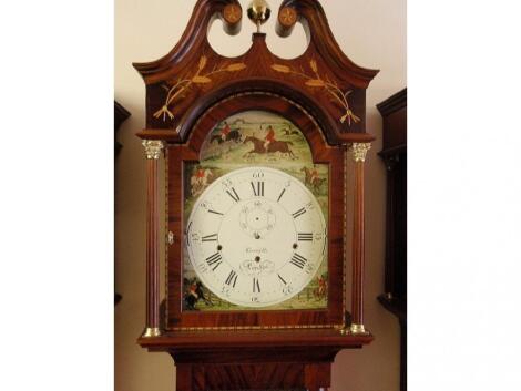 A modern traditional style long case clock by Comitti of London in a flamed mahogany case