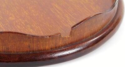 An early 20thC mahogany tray, with a flared galleried edge set with a shell patera, with overhanging base, 30cm W. (AF) - 4