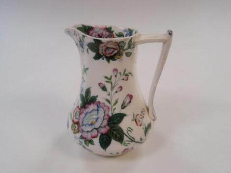 A Googerat, Evans & Glasson Swansea floral jug, 20cm