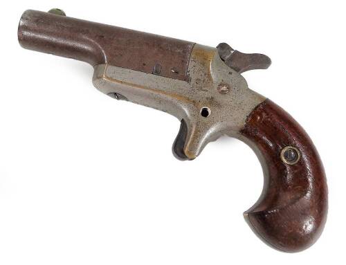 A mid 19thC Colt 3 Derringer pocket pistol, with tight curl grip, numbered 3906, marked A/CO, 8cm H.