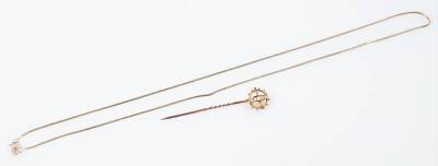 Two items of jewellery, comprising a 9ct gold articulated chain, 3.7g and a 9ct gold stick pin, set with seed pearls in cross decoration, 1.1g. (2) - 2