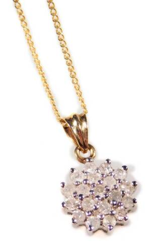 A Swarvoski crystal necklace, the cluster set pendant formed with three rows of crystal, on a drop pendant, on fine link 9ct gold chain, boxed, 1.4g all in.