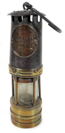 A 20thC Hailwood S improved miner’s lamp, number 7161, the cylindrical body with hook top, partially glazed body and circular foot, 29cm H.