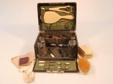 An Edward VII crocodile effect leather covered vanity case