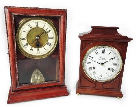 A Comitti of London mahogany mantel clock, with 13cm dial, 8 day movement, and a further mantel clock. (2)