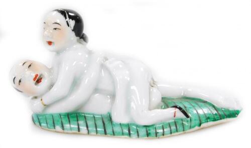 A Chinese porcelain erotic figure group