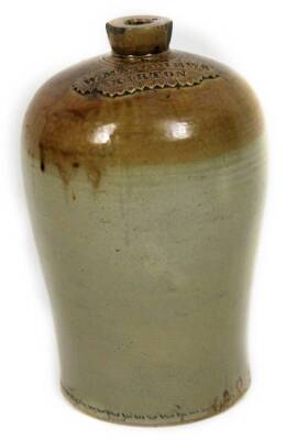 A 19thC stoneware flagon, the shouldered circular body, with raised W Matthews Kirton slab, 45cm H.