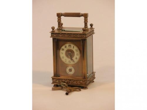 An early 20thC brass cased carriage clock