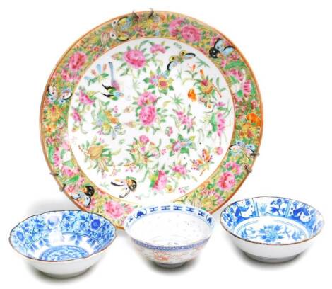 Various oriental and other wares, a late 19thC Cantonese plate polychrome decorated in famille rose colours predominately in pink and green, set with butterflies and summer flowers, 24cm Dia., and three various tea bowls. (a quantity)