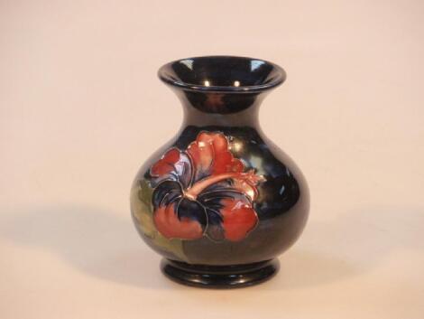 A Moorcroft pottery baluster vase