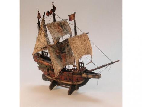 A model of a three mast gunboat