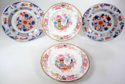 A pair of 18thC Chinese export porcelain plates, polychrome decorated with flowers in imari colours, 23cm Dia, and two further English Chinese design plates. (4)