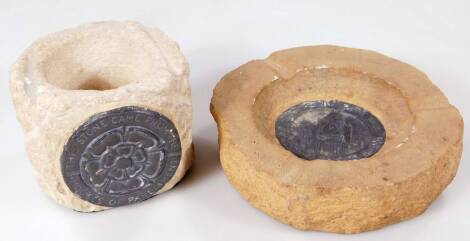 A section of Houses of Parliament stone, fronted by Tudor Rose plaque, 8cm H, and a Houses of Parliament stone ash tray, similar. (2)