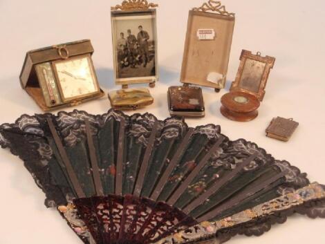 Two bevelled glass photograph frames with gilt cresting