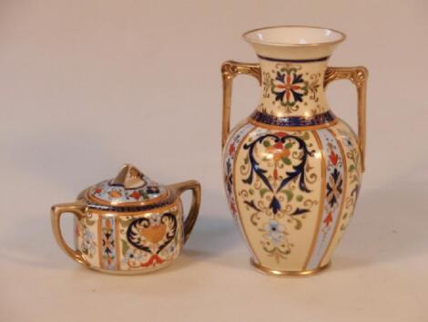 A Noritake two-handled vase and jar with cover