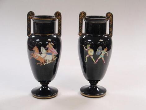 A pair of black ground two-handled ovoid vases and decorated with Pratt