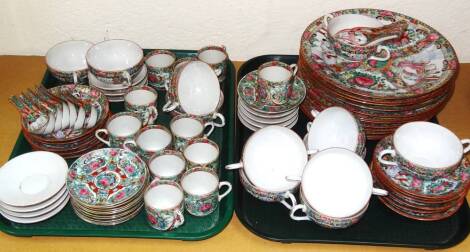 A 20thC Cantonese part service, famille rose pattern, to include dinner plates, 26cm Dia., side plates, cups, bowls, saucers, ladles, rice dishes, etc. (a quantity)