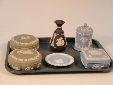 A Wedgwood Black Basalt vase and five further pieces of jasper ware