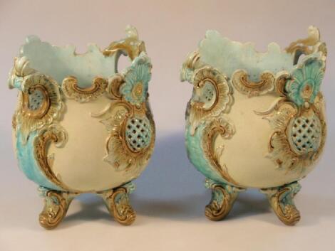 A pair of late 19thC/ early 20thC pottery jardiniere