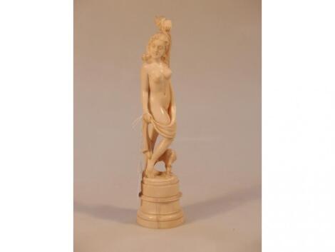 A carved ivory figure of a nude